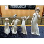 Four Nao Figures, comprising children ready for bed, a 12'' figure yawning, a child in a