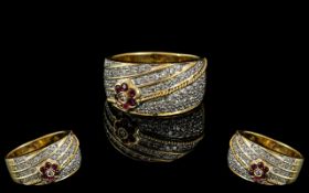 18ct Gold Stunning Ladies Diamond & Ruby Set Band Ring, of impressive design and style. The diamonds