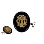 Victorian Period 9ct Gold and Black Jet Mourning Brooch / Locket. The Front of the Brooch Set with