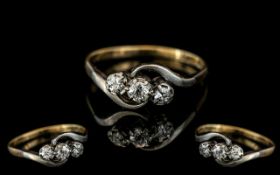 9ct and Platinum 3 Stone Diamond Ring, marked 9ct and platinum to interior of shank. The diamond