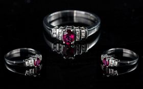 Ladies Contemporary and Attractive 18ct White Gold Ruby and Diamond Set Ring of superior quality,