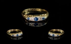 18ct Gold and Platinum Sapphire and Diamond Set Ring. Marked 18ct and Platinum to Interior of Shank.