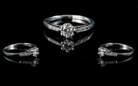 Ladies Platinum Single Stone Diamond Ring with diamond set shoulders, marked 950 platinum to