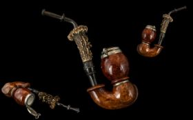 A Bruges Elsi Pipe, with burr maple bowl, nickel mounts, and antler mouthpiece.
