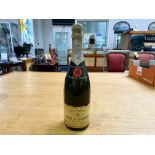 A Bottle of Brut Imperial Moet & Chandon Champagne Epernay France 75cl. Seals intact.