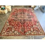 Vintage Red Ground Persian Heriz Rug from Iran. Measures approx 290 x 200 cm.