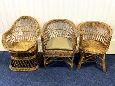 Three Children's Vintage Wicker Chairs, one with seat padding, different designs and patterns.