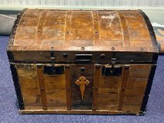 Large Wooden Metal Bound Trunk, with a collection of small rugs. Trunk full of small rugs, various