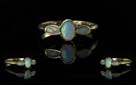 Ladies 9ct Gold Attractive 3 Stone Opal Set Ring. Full Hallmark for 9.375 to Interior of Shank.