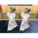 Two Lladro Angels, measuring approx. 9'' tall, 'Curious Angels'. In excellent condition. HN 4960.