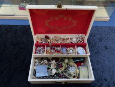 Cream Tiered Jewellery Box containing a quantity of costume jewellery, comprising brooches,