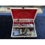 Cream Tiered Jewellery Box containing a quantity of costume jewellery, comprising brooches,