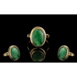 Ladies 9ct Gold Attractive Jade Set Dress Ring marked 9ct to interior of shank. The oval shade