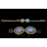 Ladies Attractive 9ct Gold Opal & Diamond Set Bracelet. The two central oval shaped opals of