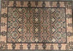 Large Hand Made 100 % Wool Rug. Typical Design on Green Ground. Slightly Worn Condition - Please See