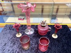 Collection of Ruby Glass, comprising a tall 11.5'' vase with leaf edge raised on a clear glass base,