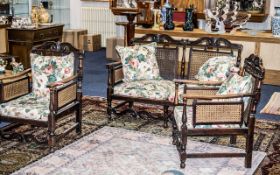An Early 20th Century Oak Bergere Suite Carved Back Rail And Turn Supports With Drop In Seats And