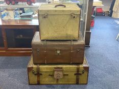 Three Vintage Large Travelling Trunks, comprising: 1. Selfridges large travelling trunk, label to