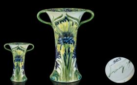 William Moorcroft Signed Twin Handled Blue Cornflower Design Vase. c.1900 - 1902. Signed William
