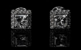 Ladies 18ct White Gold Fine Quality Pair of Diamond Set Earrings, of square form. The diamonds of
