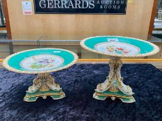 Two Victorian Cake Stands, with three dolphin design to each pedestal, supporting the cake plate, on