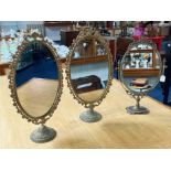 Three Brass Continental Style Toilet/Hall Table Mirrors. Approx height 22''.