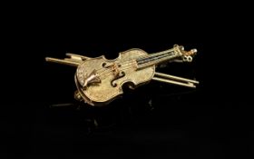 9ct Gold Violin Brooch, set with Sapphires and Diamonds, Fully Hallmarked, Gross Weight 5.8 grams