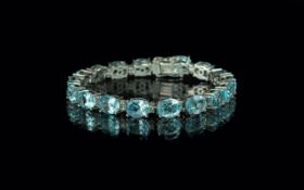 Blue Topaz Tennis Bracelet, a stunning 37cts of oval cut, clear, sparkling blue topaz set in a