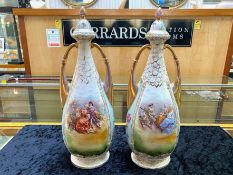 Two 16.5'' Tall Austrian Hand Painted Lidded Vases, with gilt decoration and twin handles and panels