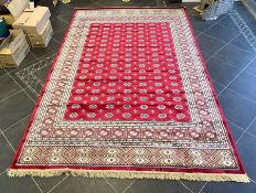 Rich Red Ground Full Pile Kashmir Carpet, all over Bokhara design. Measures 2 m x 3 m.