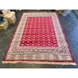 Rich Red Ground Full Pile Kashmir Carpet, all over Bokhara design. Measures 2 m x 3 m.