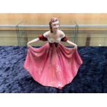 Lawton Studio Figure 'Jane', measures 7'' tall, of a lady in a ball gown courtseying.