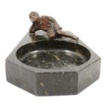 Black ashtray with laying down boy