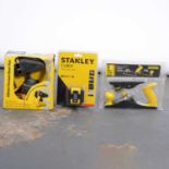 A box of various hand tools including a Stanley Cubix cross line laser, planes, vices etc,