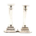 A pair of silver candlesticks by James Dixon & Sons Ltd, Sheffield 1909.