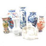 Fugian inspired model of Hoti, and six oriental vases,