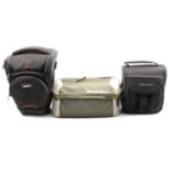A good quantity of camera carry bags, two boxes