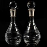 Pair of glass decanters with silver rims, Carr's of Sheffield Ltd, Sheffield 2003.