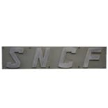 Original French railway metal sign 'SNCF', 23cm by 109cm.