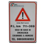 Italian railway station metal sign 'Linea Bari-Lecce - PL km 711+369'