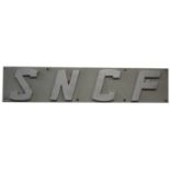 Original French railway metal sign 'SNCF', 23cm by 109cm.