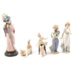 Five Lladro figurines.