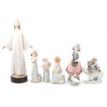 Six Lladro figurines.