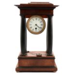 Charles X mahogany and ebonised portico clock,