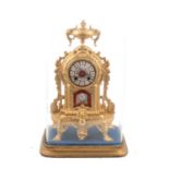French gilt spelter mantel clock, under a glass dome,