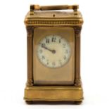 French brass serpentine cased carriage clock,