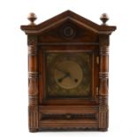 Late Victorian walnut and beechwood mantel clock,