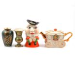 Musical Humpty Dumpty jug, two Crown Devon Lustrine vases, and a Coronation coach teapot.