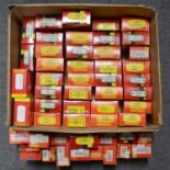 Fifty-one Hornby OO gauge model railway wagons and vans