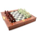 Chinese simulated jade chess set, in a folding chessboard, width 46cm; and a collection of masks and